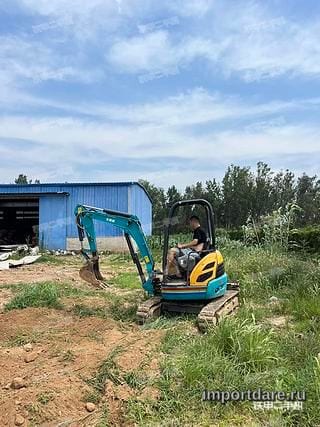 Kubota U-20-5 сбоку