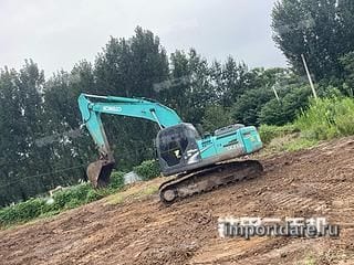 Kobelco SK210LC-8 сбоку