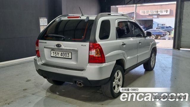 KIA NEW SPORTAGE 2010 — 156 515 км, серебристо-серый, Корея — под ключ — фото 2