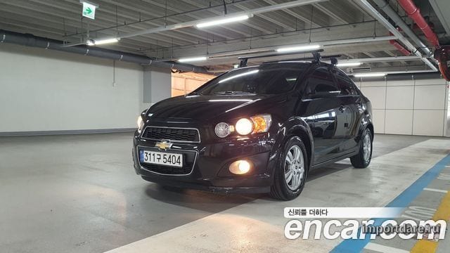 CHEVROLET AVEO SEDAN 2015 — 107 658 км, чёрный, Корея — под ключ — фото 1