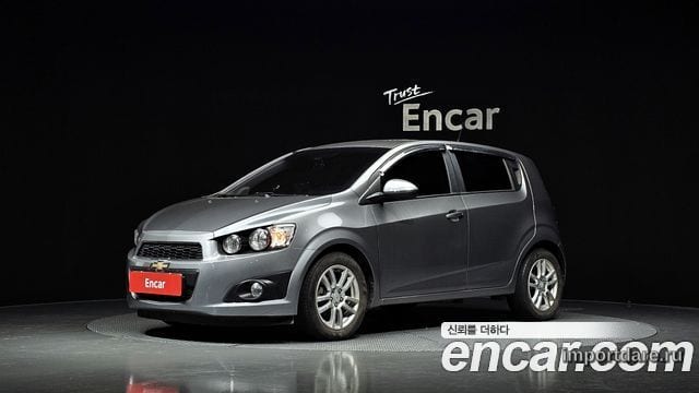 CHEVROLET AVEO HATCHBACK 2012 — 125 874 км, серебристый, Корея — под ключ — фото 1