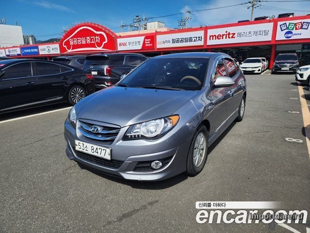HYUNDAI AVANTE HYBRID 2012 — 176 760 км, серебристо-серый, Корея — под ключ — фото 1