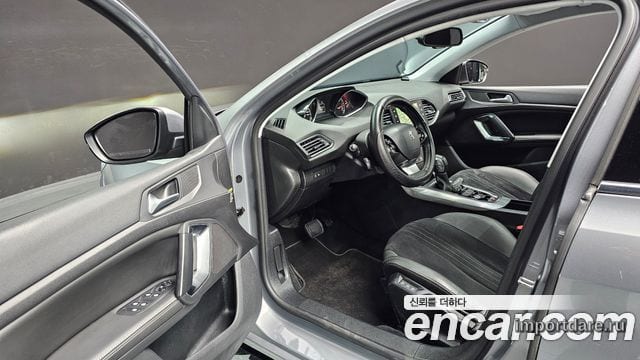 PEUGEOT 308 2015 — 169 749 км, серебристо-серый, Корея — под ключ — фото 10