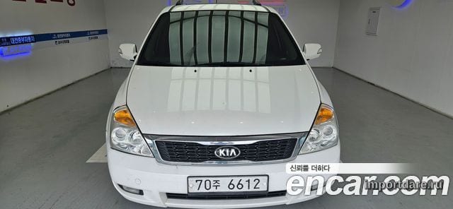 KIA CARNIVAL R 2013 — 319 950 км, белый, Корея — под ключ — фото 1