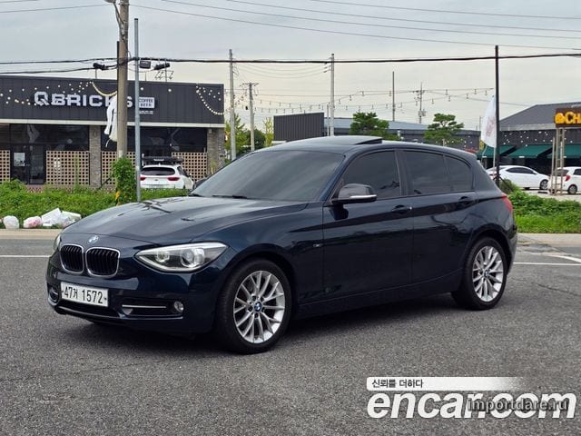 BMW 1 SERIES 2015 — 116 000 км, синий, Корея — под ключ — фото 1