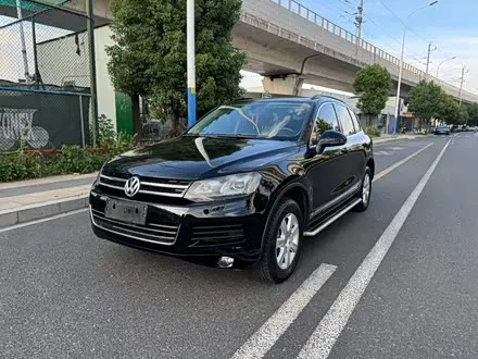 VOLKSWAGEN TOUAREG 2014 — 100 000 км, Китай — под ключ — фото 1
