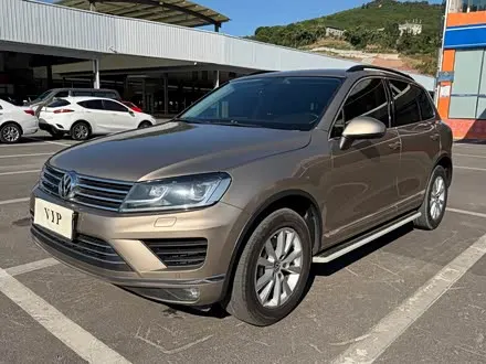 VOLKSWAGEN TOUAREG 2017 — 138 000 км, Китай — под ключ — фото 1