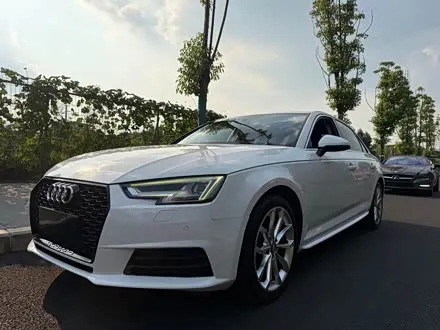 AUDI A4L 2019 — 80 000 км, Китай — под ключ — фото 1