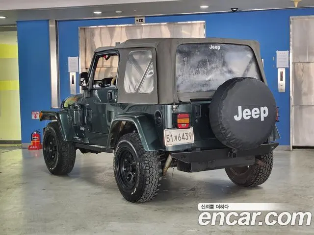 JEEP WRANGLER 2003 — 85 000 км, тёмно-зелёный, Корея — под ключ — фото 2