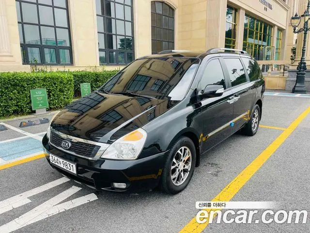 KIA CARNIVAL R 2013 — 191 307 км, чёрный, Корея — под ключ — фото 1