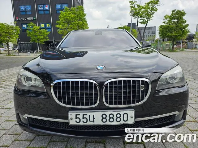 BMW 7 SERIES 2010 — 142 900 км, чёрный, Корея — под ключ — фото 1