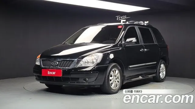 KIA CARNIVAL R 2012 — 209 780 км, чёрный, Корея — под ключ — фото 1
