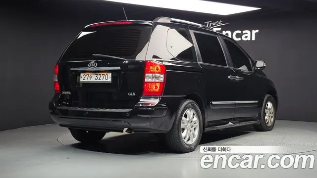 KIA CARNIVAL R 2012 — 209 780 км, чёрный, Корея — под ключ — фото 2