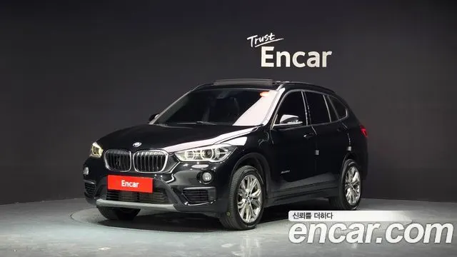 BMW X1 2018 — 94 104 км, чёрный, Корея — под ключ — фото 1