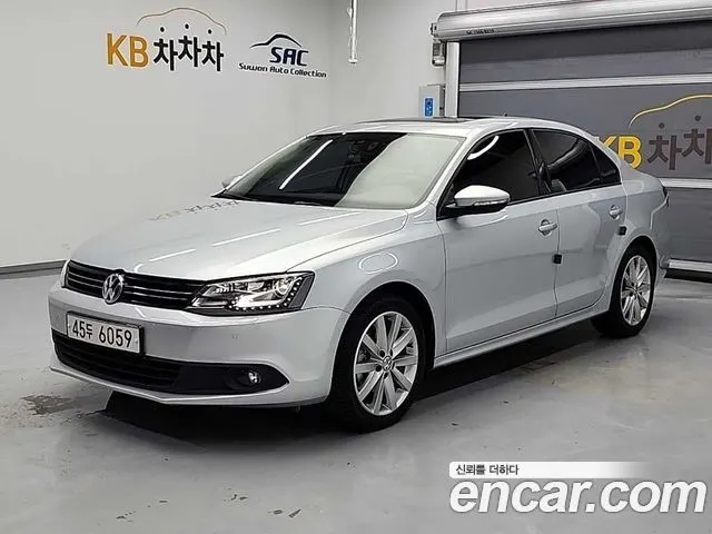 VOLKSWAGEN JETTA 2014 — 22 954 км, серебристый, Корея — под ключ — фото 1
