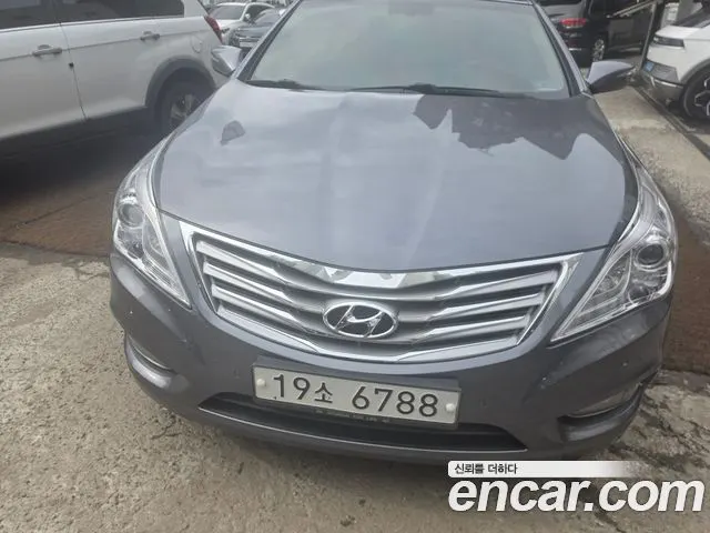 HYUNDAI GRANDEUR 2012 — 168 000 км, серебристо-серый, Корея — под ключ — фото 1