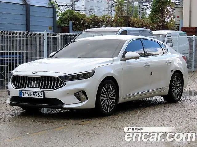 KIA K7 PREMIER HYBRID 2021 — 63 502 км, белый, Корея — под ключ — фото 1