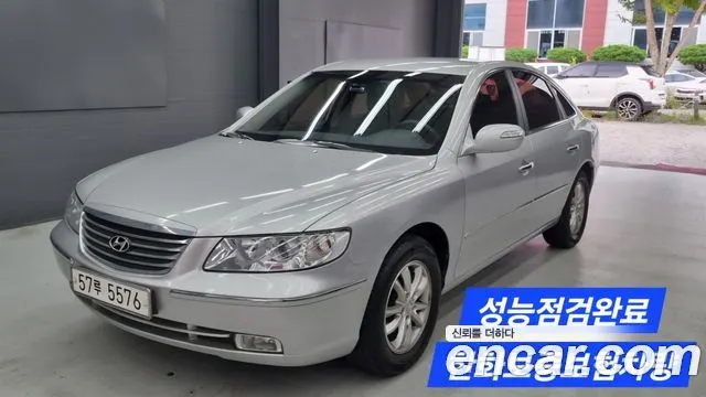 HYUNDAI GRANDEUR NEW LUXURY 2010 — 65 090 км, серебристо-серый, Корея — под ключ — фото 1