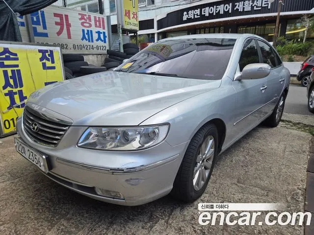 HYUNDAI GRANDEUR NEW LUXURY 2009 — 176 500 км, серебристый, Корея — под ключ — фото 1