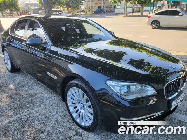 BMW 7 SERIES 2013 — 273 685 км, чёрный, Корея — под ключ — фото 1