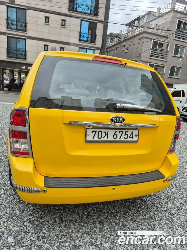 KIA CARNIVAL R 2012 — 157 000 км, жёлтый, Корея — под ключ — фото 2