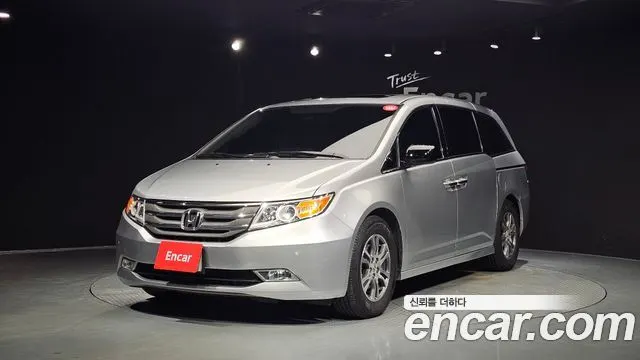 HONDA ODYSSEY 2013 — 151 643 км, серебристо-серый, Корея — под ключ — фото 1
