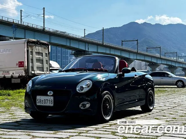 DAIHATSU COPEN 2016 — 146 465 км, тёмно-зелёный, Корея — под ключ — фото 3